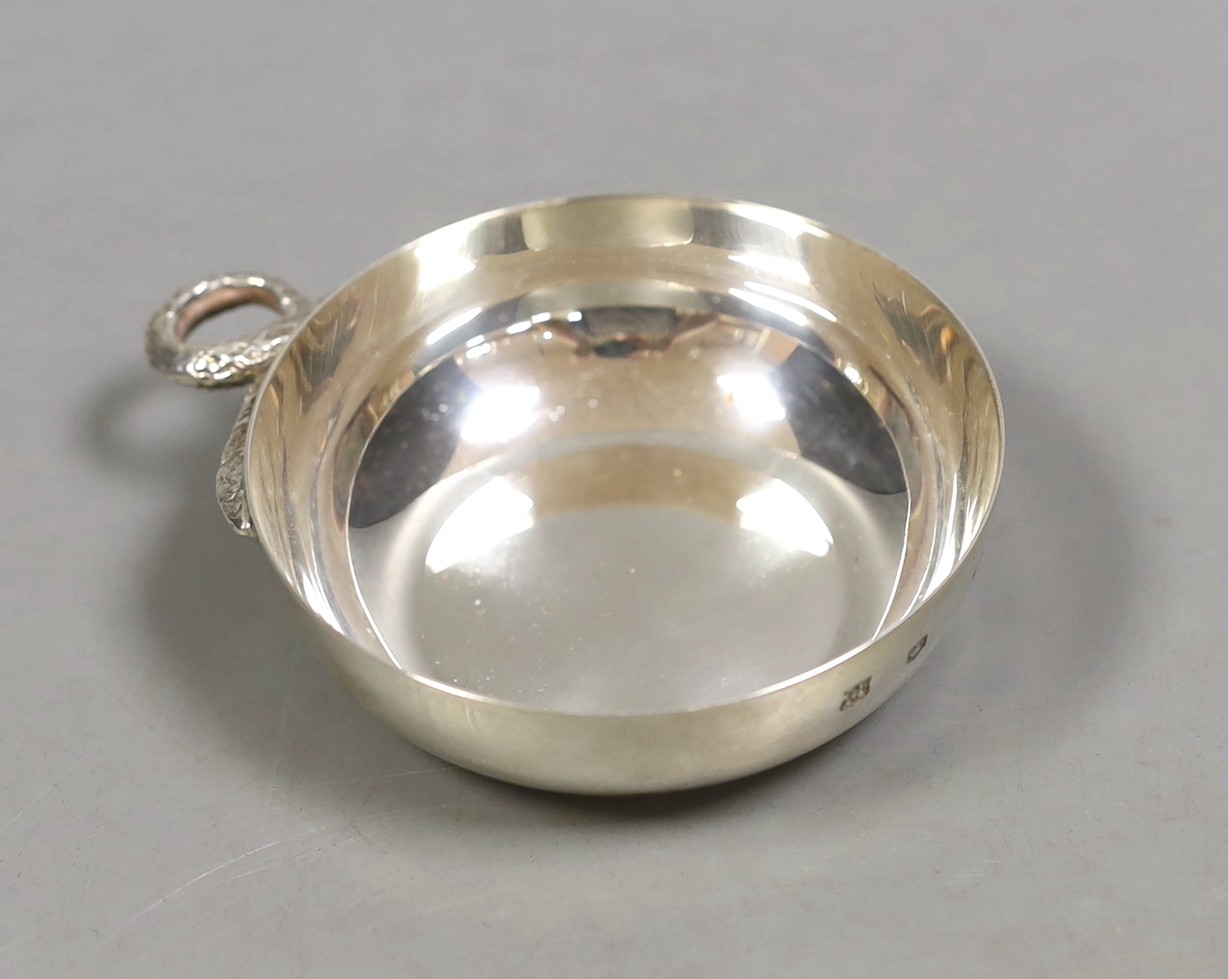 A modern silver taste du vin, with serpent handle, Cooper Brothers & Sons, Sheffield, 1973, 10.2cm, 83 grams.